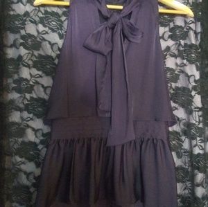 Purple sleeveless blouse